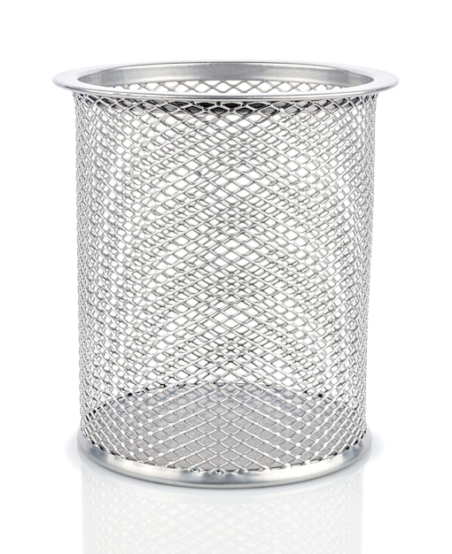 Empty desktop silver metal mesh holder cup for pens and pencils isolated on white