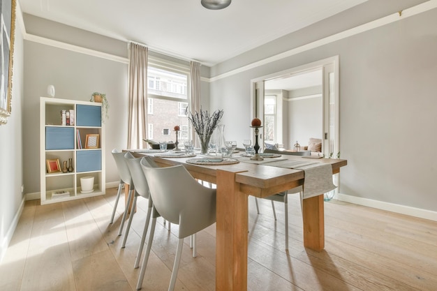 Empty dining room near kitchen