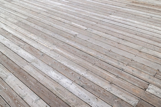 Empty dry flat gray wooden deck background with perspective