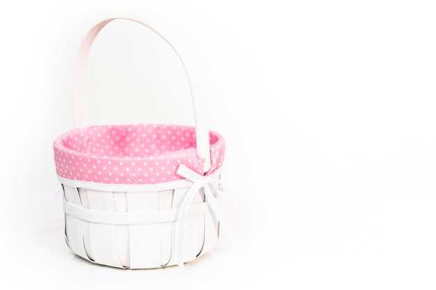 Photo empty easter basket on a white background.