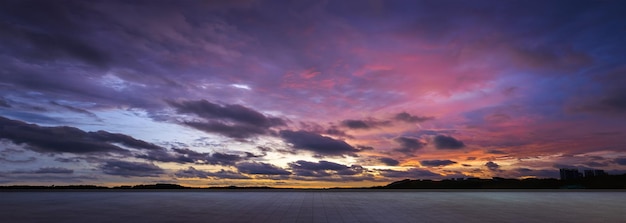 Empty floor with dramatic suset sky