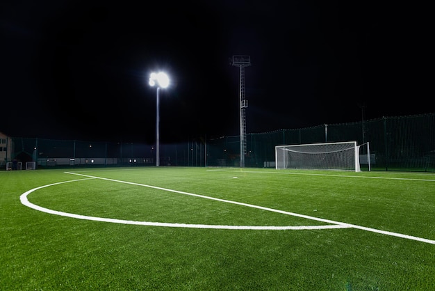 Empty football field at night