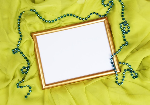 Empty frame on beautiful silk background