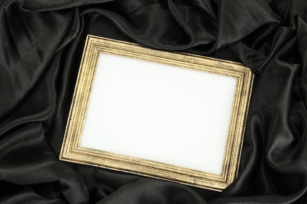 Empty frame on beautiful silk