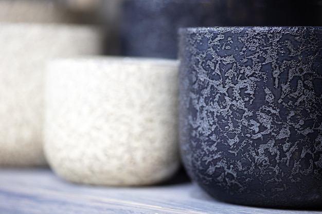 Empty garden pots in a row close up