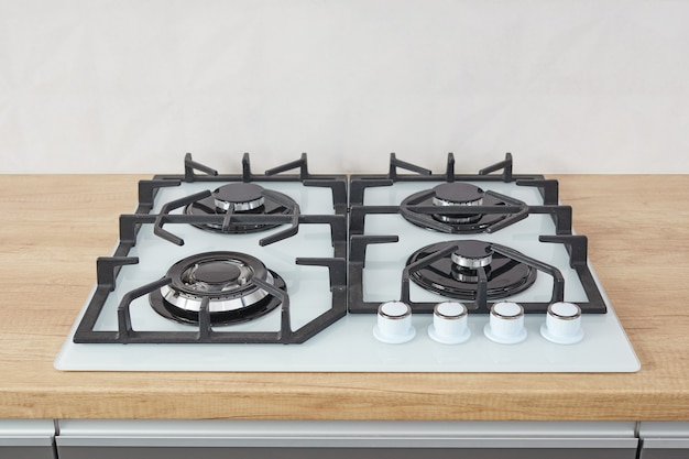 Empty gas hob in the kitchen interior. Close up.