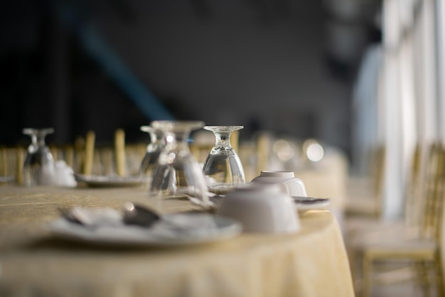 Empty glass of water on the table with blur background