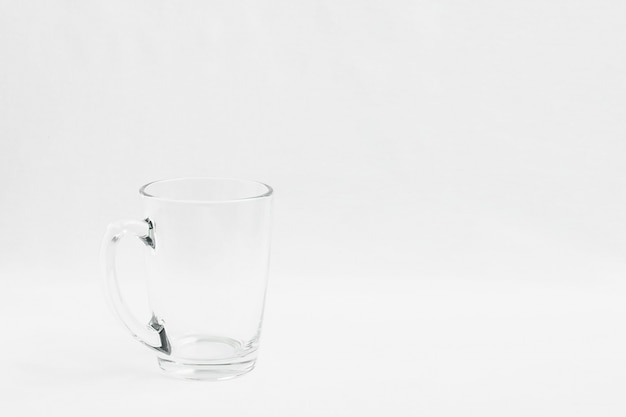 Empty glass on white