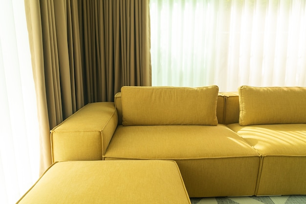 Empty golden mustard sofa in living room