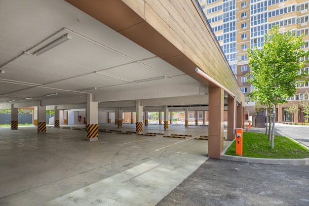 Empty ground parking in the yard of a modern house new building