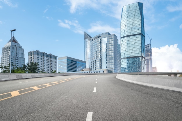 Empty highway with cityscape and skyline of qingdao,China.