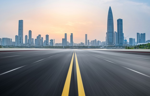 Empty highway with cityscape and skyline of shenzhen, China.