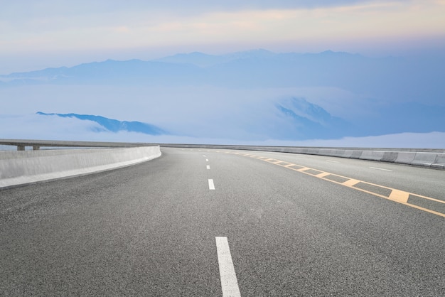 Empty highways and distant mountains