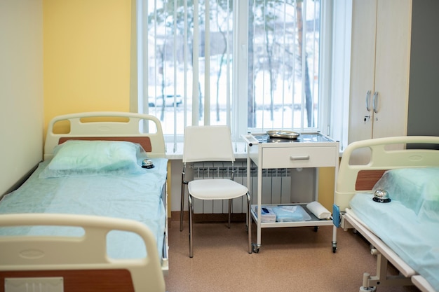 An empty hospital room all patients have been discharged medical institution