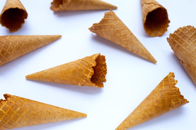 Empty ice cream cone on white background