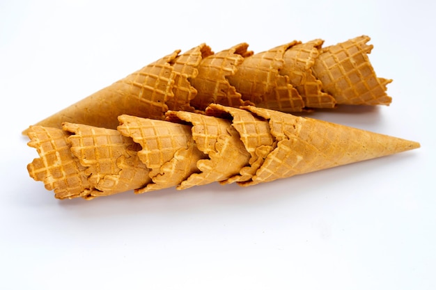 Empty ice cream cone on white background