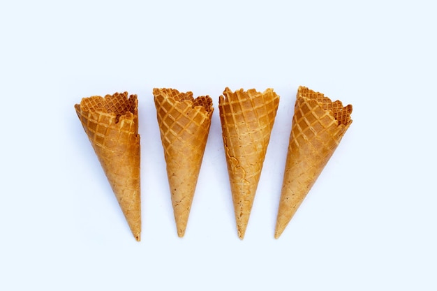 Empty ice cream cone on white background