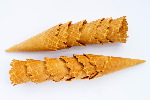 Empty ice cream cone on white background