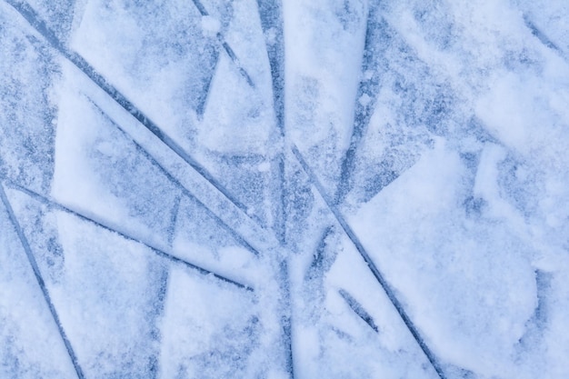 Empty ice rink with skate marks after the session outdoor. skating ice rink texture covered