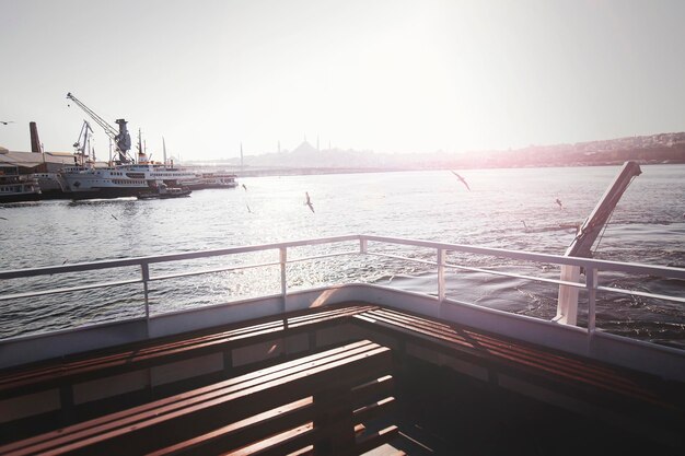 An empty image for manipulation Shipyard ferries and Istanbul Silhouette view during a foggy day from modern looking vessel