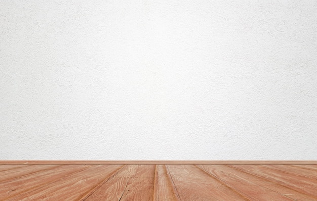 Empty interior room with white cement wall background and brown wooden floor