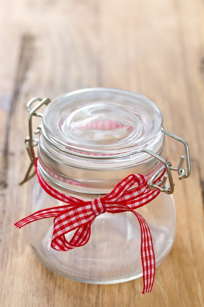 Empty jar on brown surface