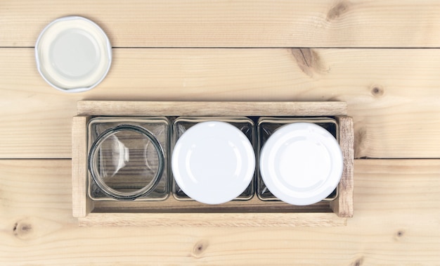 Empty jar on wood table background