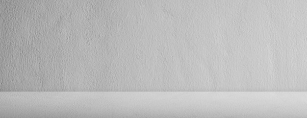 Foto vuoto cucina stanza studio officina bar sfondoombra leggera sulla struttura desktopmodello muro grigiotavolo bianco nero modello di marmo vecchio pavimento di cemento per la presentazionepietra di cemento materiale grigio