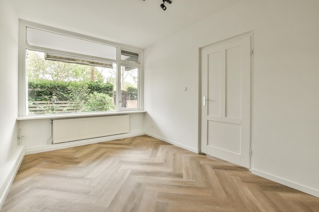 Empty living room with open kitchen