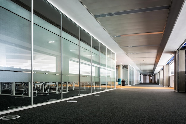 Empty long corridor in the modern office building