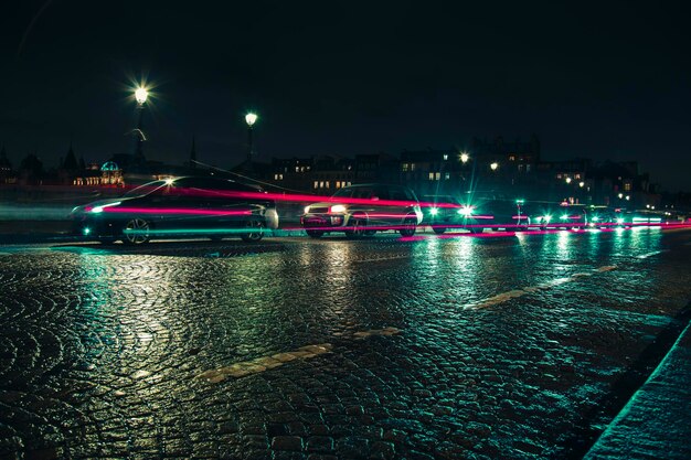 Empty long exposure light trail shot road view from a Paris Street for design background during night