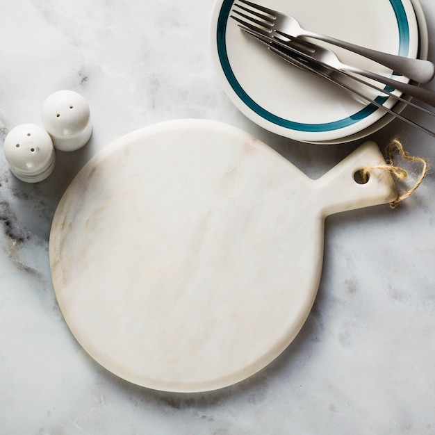 Empty marble cutting board on a table