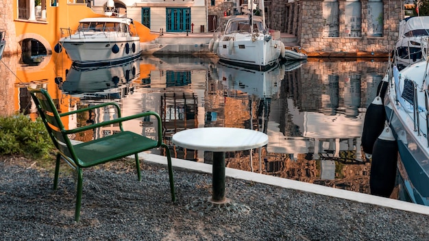 Empty marble table in front of marina background