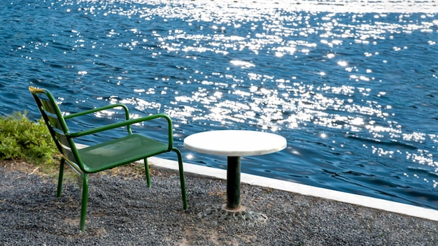 Empty marble table on sea sparkle background