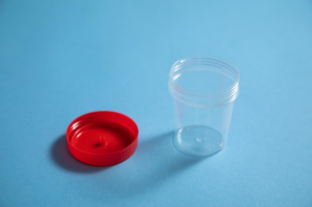 Empty medical container on the blue background