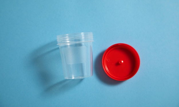 Empty medical container on the blue background