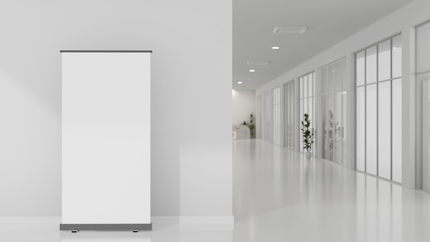 an empty mockup poster stands on the floor in a building hallway or corridor area