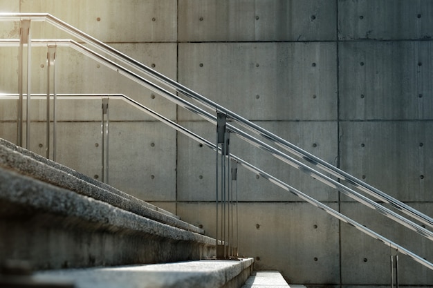 Empty Modern Cement Staircase in City with Morning Sun Light. Urban Background. Selective Focus, Side View