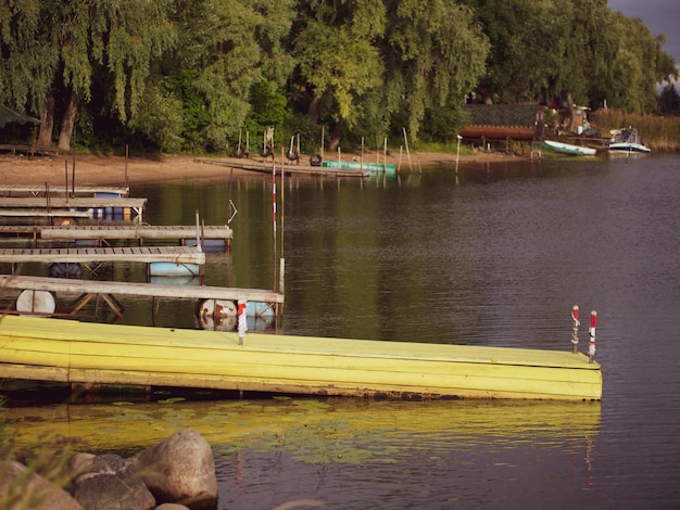 Empty moorings for wooden boats in the countryside