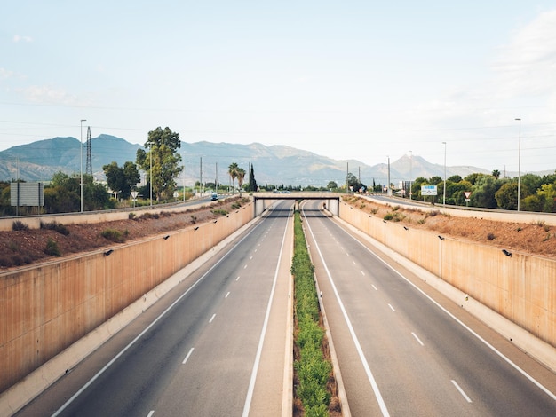 Empty multilane highway photographed from the bridge