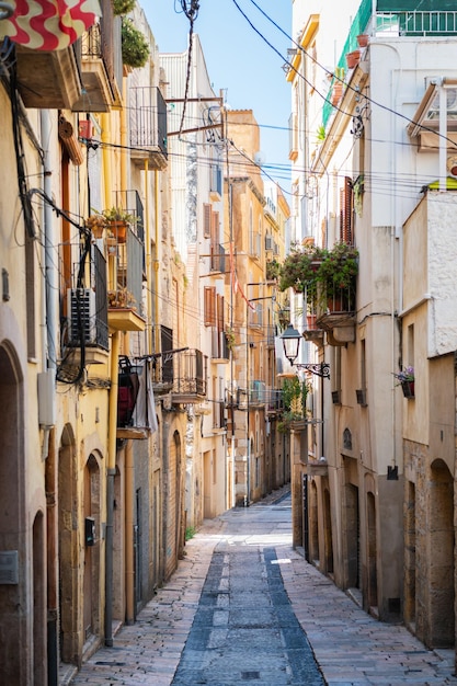 Empty narrow street in the old town of Tarragona