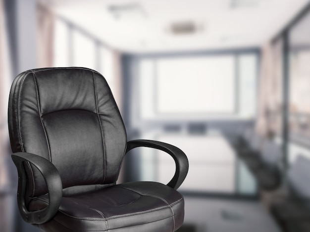 Empty office chair with office background