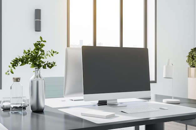 Empty office room with a blank desktop computer on the glass table big window interior design concept 3d rendering mock up