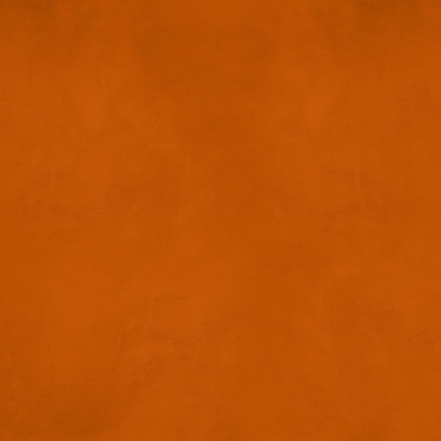 空のオレンジ色の茶色のコンクリートの壁の背景