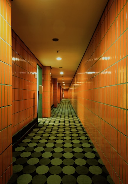 Empty orange corridor along walls in icc berlin