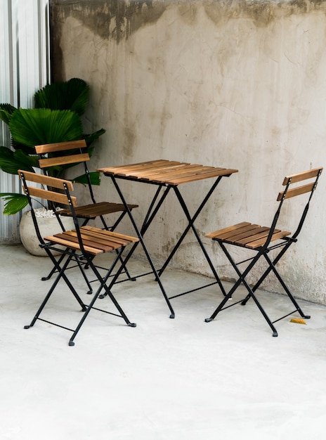 empty outdoor patio table and chair