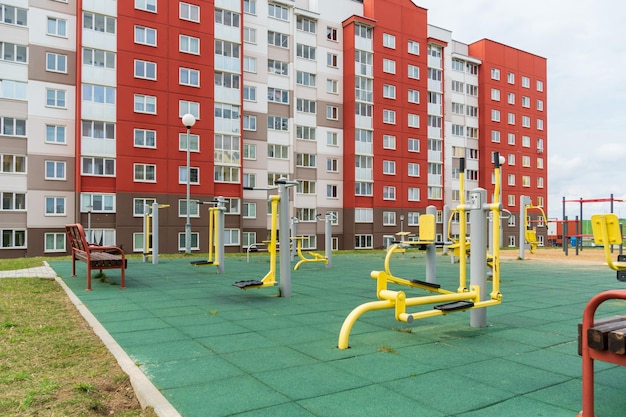 An empty outdoor sports ground with outdoor exercise equipment and modern rubber coating Metal vandalproof sports equipment in the park Outdoor sports and fitness activities