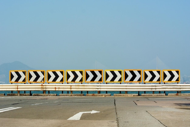 Empty parking lot against clear sky