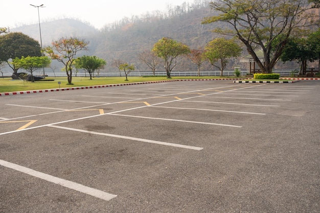 Empty parking lot parking lane outdoor in the park.