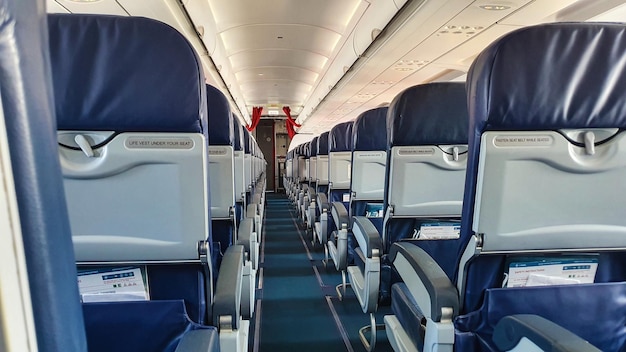 Empty passenger airliner interior of the passenger airplane travel transportationflying design concept
